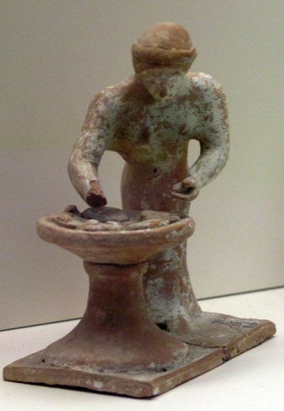 Greek photo 415px-NAMA_Figurine_peacutetrissante_1_zps3fffdfe4.jpg